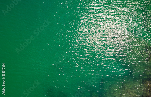 Sea surface aerial view,Bird eye view photo of green waves and water surface texture, Green sea water background Beautiful nature Amazing view