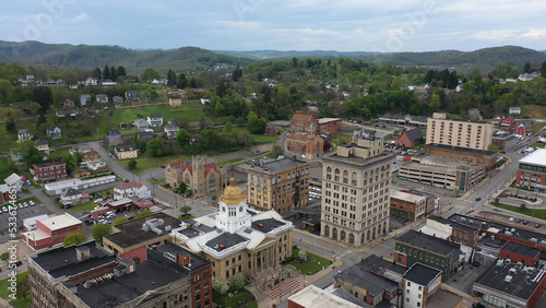 The Marion County courthouse in Fairmont, WV, and the surrounding small town river and countryside in the appalachian mountains.