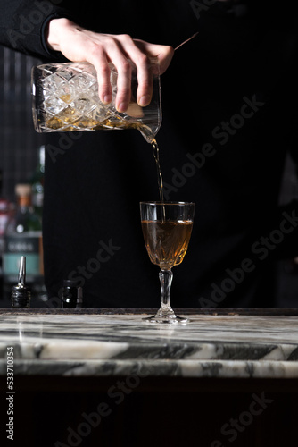 Pouring cocktail