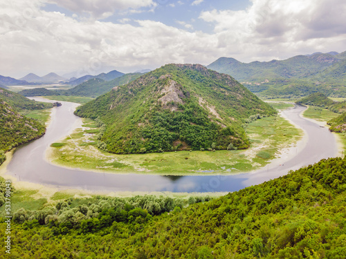 Canyon of Rijeka Crnojevica river near the Skadar lake coast. One of the most famous views of Montenegro. River makes a turn between the mountains and flows backward Portrait of a disgruntled girl