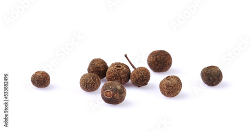 Heap of black peppercorns isolated on white background with clipping path 
