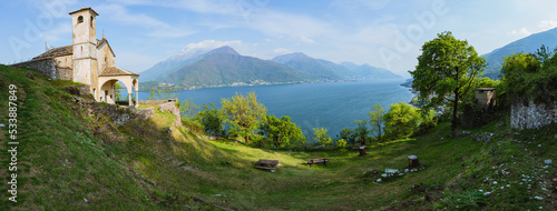 The landscape of Lake Como during spring, near the town of Musso, Italy - May 2022.