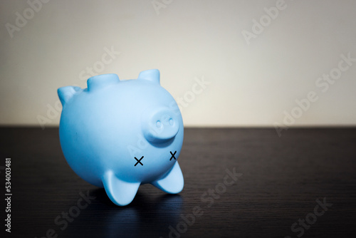 piggy bank inverted, concept of poverty, bankruptcy, crisis and default