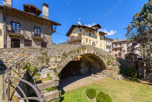 Aosta, Italy. View of the Roman Bridge between the houses of the city center. April 17, 2022.