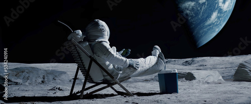 Astronaut sits in a beach chair on a Moon surface, holding phone in hands