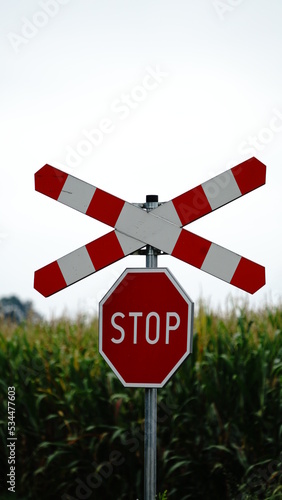 Znak drogowy stop, przejazd kolejowy, przejazd przez tory. Stop sign.