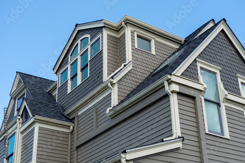 Large historic home under blue sky