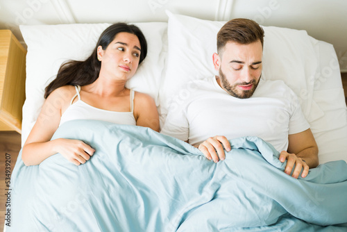 Worried man having erectile dysfunction problems with his partner