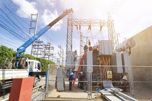 Maintenance​ repair Power transformer with crane of industrial, High volt​ transformer​ in substations.