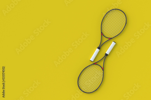 Two tennis racquets on yellow background. Sports equipments. International tournament. Game for laisure. Favorite hobby. Copy space. Top view. 3d render