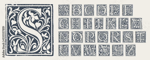Alphabet in medieval gothic style. Set of monochrome grunge style emblems.
