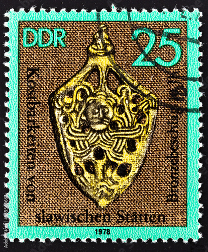 Postage stamp 'Bronze fittings of a sword scabbard' printed in East Germany. Series: 'Valuables of Slavic Treasures Sites', 1978