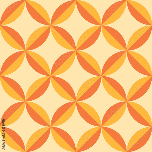 Mid century modern geometric circle leaves seamless pattern in yellow and orange. For textile, home décor, wallpaper and wrapping paper 