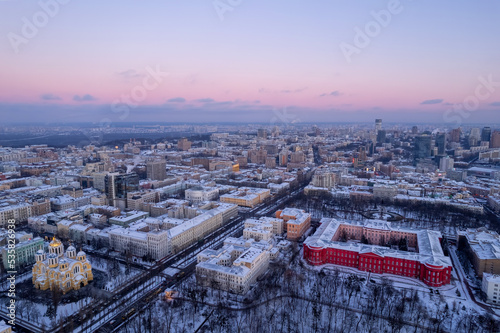 aerial view of winter city Kyiv covered in snow