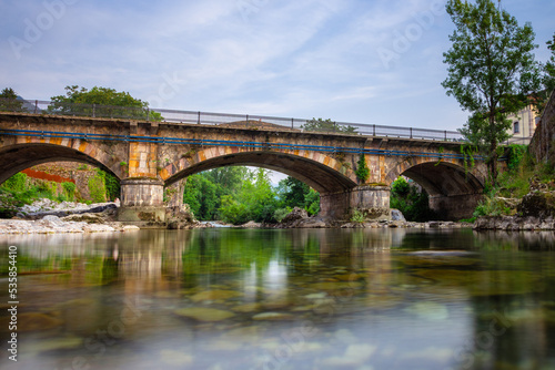 Medieval village of Cangas de Onis with hanging houses and Sella river, Asturia, Spain.