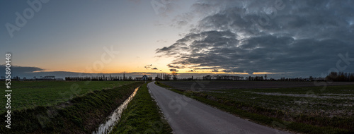Panoramic view over the Belgian countryside in the agriculture fields of the polders