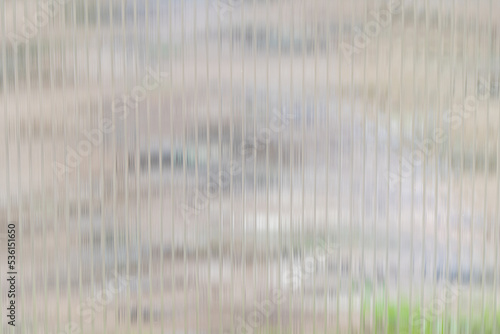 Translucent polycarbonate sheets on the greenhouse in summer are sheltered from the cold