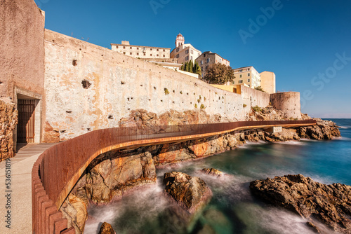 The L'Aldilonda walkway along the rocky east coast and city wall below the citadel of Bastia on the east coast of Corsica