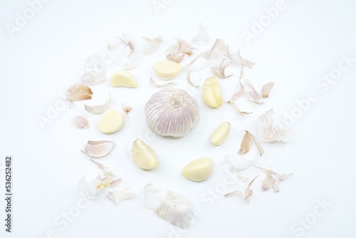 garlic and peel on white background isolate