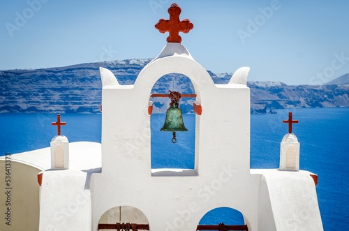 Beautiful shot of the Three Bells of Fira, Firostefani in Greece
