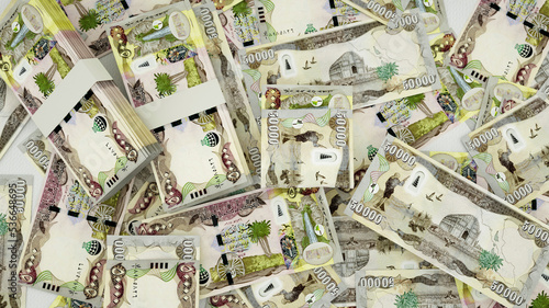 3D rendering of Iraqi dinar notes spread on surface