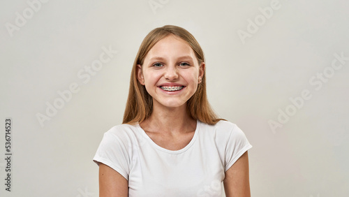 Portrait of smiling caucasian girl with braces