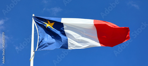 The flag of Acadia was adopted on 15 August 1884, at the Second Acadian National Convention held in Miscouche, Prince Edward Island, by nearly 5,000 Acadian delegates from across the Maritimes.