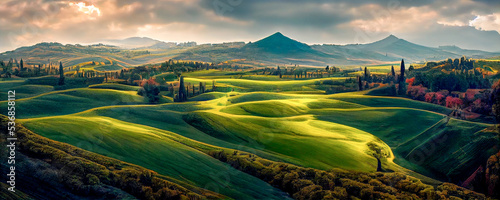 Beautiful and miraculous colors of green spring panorama landscape of Tuscany, Italy. Tuscany landscape with grain fields, cypress trees and houses on the hills at sunset. 