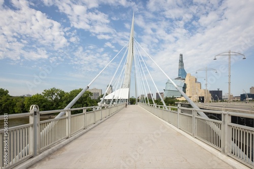 Esplanade Riel bridge with a cloudy blue sky in the background, Winnipeg, Manitoba, Canada