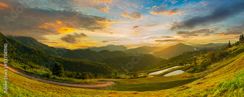 Summer mountain landscape in Thailand,Panorama of the Romanian countryside at sunset in the evening light. wonderful spring landscape in the mountains meadows and rolling hills, rural scenery