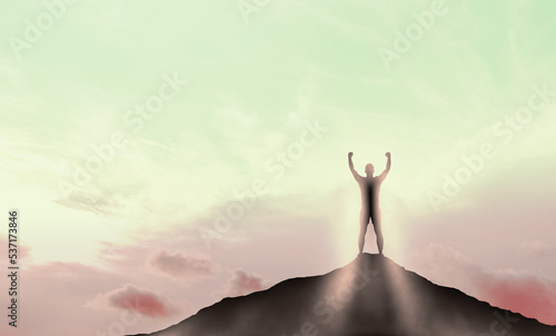Man Standing Against sunrise. Silhouette man Standing Against sunset sky. success, achievement and goal concept. competition and leadership concept. man standing on top of mountain