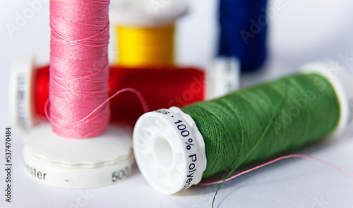 sewing thread in different colors and 100 percent polyester