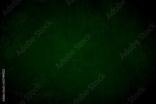 Green dark concrete texture wall background on black. Wallpaper pattern curved rough dark cement stone. Floor sand surface clean polished. Photo abstract construction old grunge for design urban.