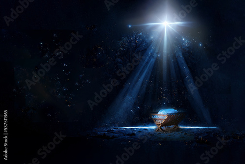 Nativity scene. Christian Christmas concept. Birth of Jesus Christ. Wooden manger in dark blue night. Banner, copy space. Jesus is reason for season. Salvation, Messiah, Emmanuel, God with us, hope