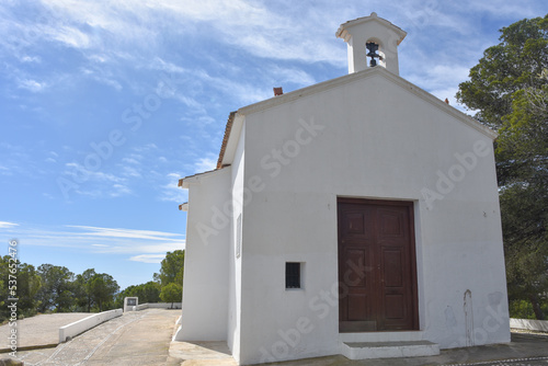 San Salvador Hermitage, a small white chapel overlooking the resort town of Calpe, Alicante, Spain