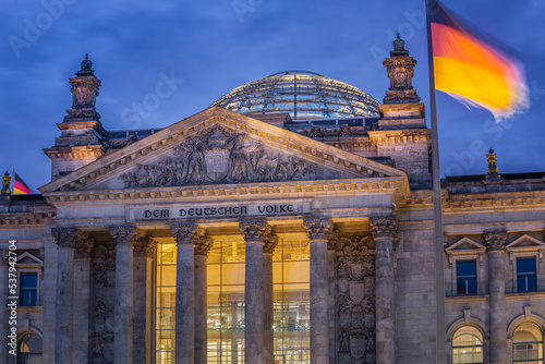 Reichstag building, seat of the German Parliament with national flag, Berlin