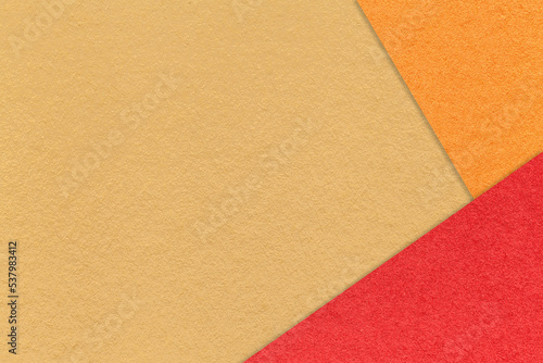 Texture of craft yellow color paper background with red and orange border. Vintage cardboard. Presentation template