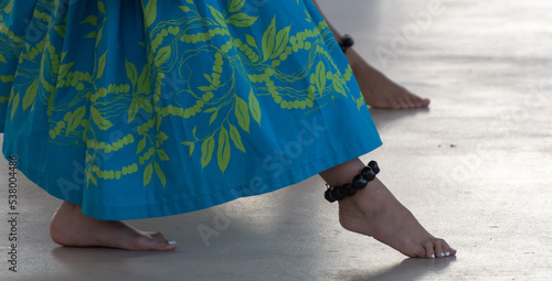 Legs of hula dancers performing in Waikoloa - 4