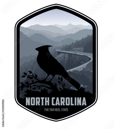 North Carolina vector label with Red Male Northern Cardinal near Blue Ridge Parkway