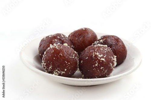 Closeup of Kala Jamun Indian Sweets in a Plate Isolated on White Background