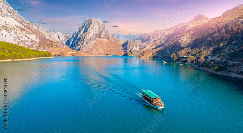 Green Canyon Turkey with tourist ship, Manavgat Mountain Lake Aerial top view