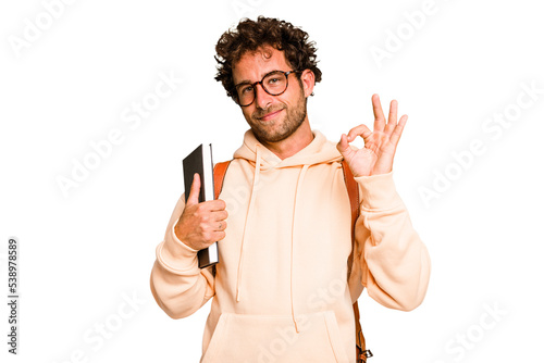 Young caucasian student man isolated cheerful and confident showing ok gesture.