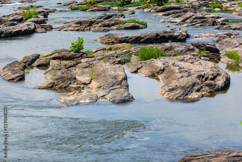 A rocky section of the Potomac River where the water is low.