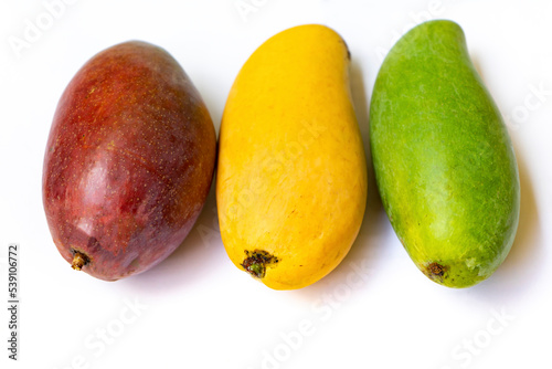 Various species of mango with isolated white background. mango fruit is one of the most popular, nutritionally rich fruits with unique flavor, fragrance, taste, and heath promoting qualities.