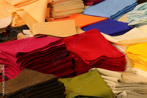 scraps of felt cloth and colored fabrics for sale in the shop