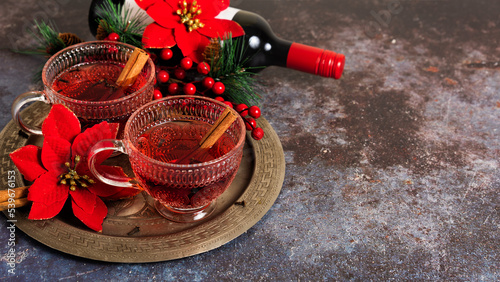 Mulled wine in glass cups, spiced hot alcoholic drink