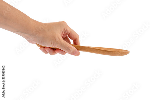 Woman hand with wooden spoon isolated on transparent background