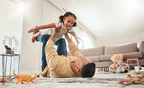 Happy family, father and girl playing in a house with freedom, bonding and enjoying quality time together. Happiness, smile and child flying in dads arms on the floor on a weekend at home in Portugal