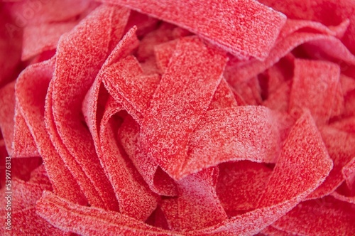 Closeup of a heap of strawberry belts.