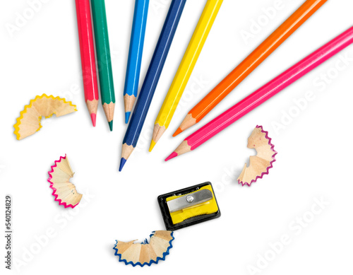 Set of colored pencils of different colors and a sharpener with shavings